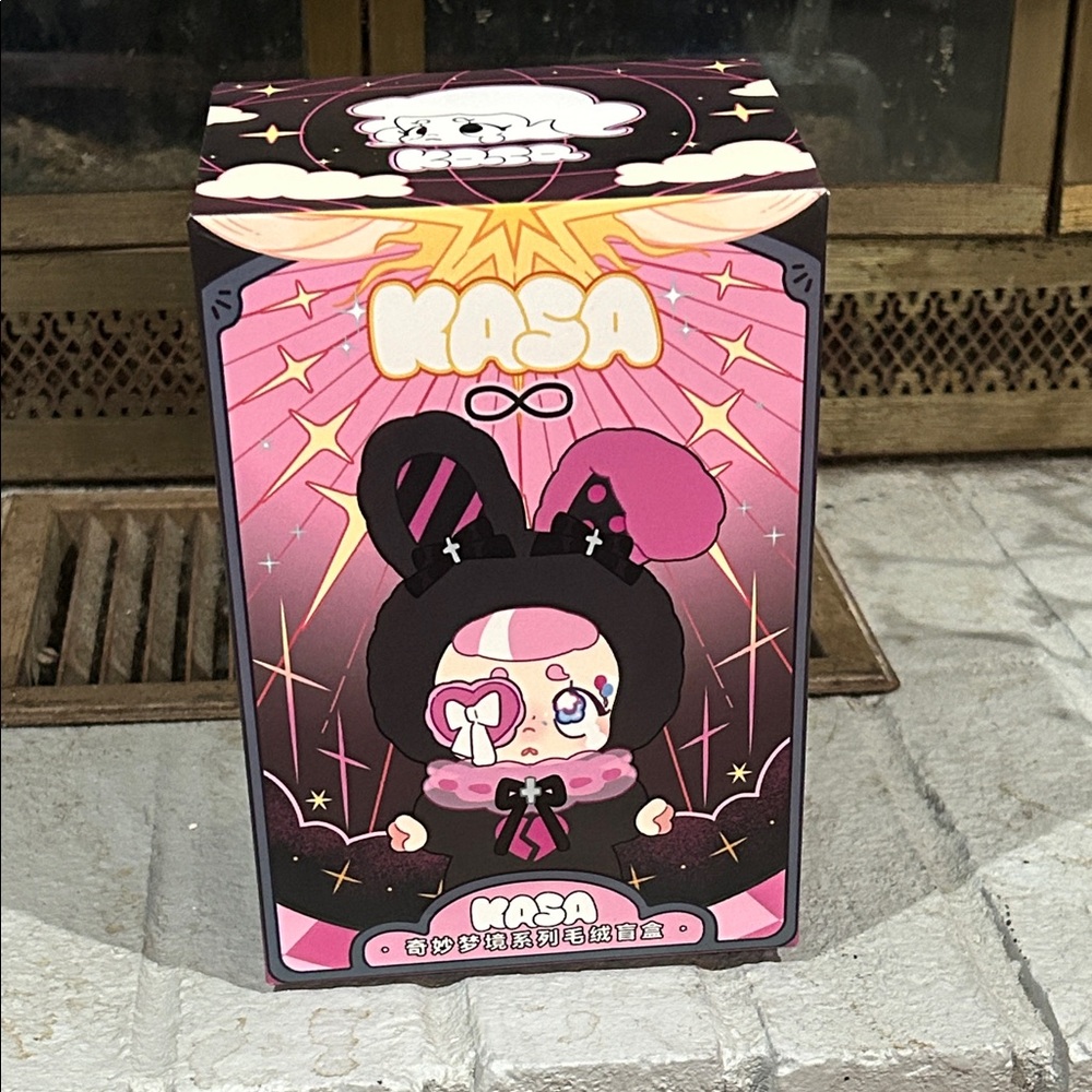 Pink and Black Stuffed Animal Toy